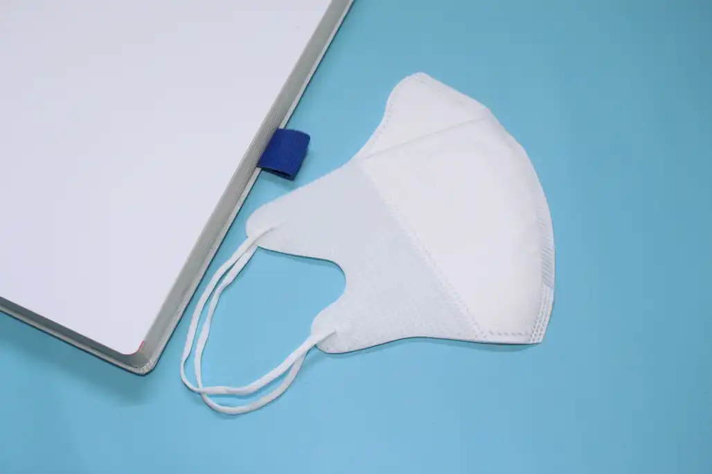 Marker duckbill diletakkan di samping buku. Source: seikatsunohana/Freepik